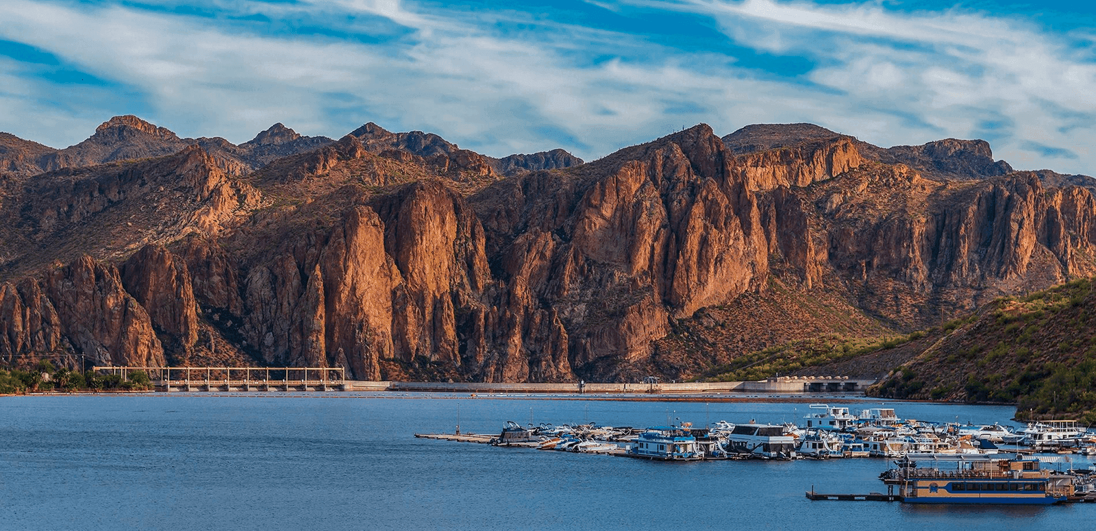 Saguaro Lake marina with canyon cliffs behind the water